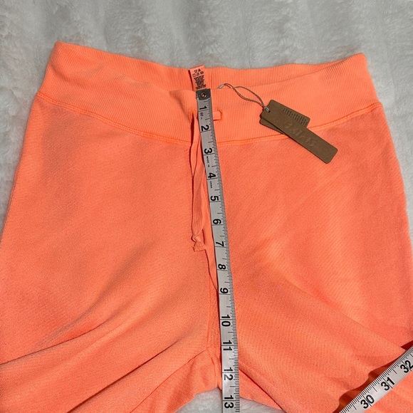 SKIMS NWT Size Medium Light French Terry Flare Pant Neon Orange - Picture 7 of 9